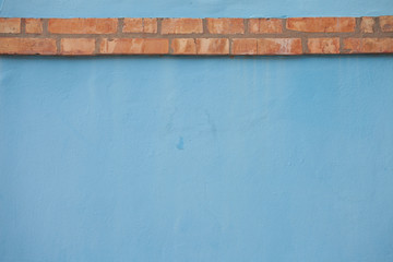 detail from an external blue wall in Burano island, Venice