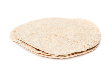 Pile of wheat tortillas isolated