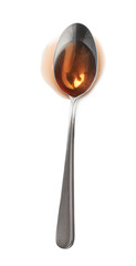 Steel spoon in a puddle of wine vinegar