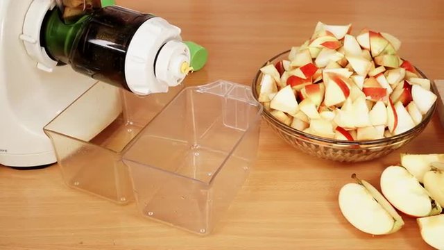Nobody. Apple fruits and juicer machine in kitchen 4K
