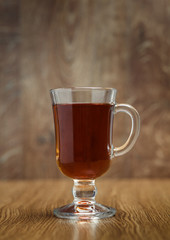 Cup of tea on a wooden background