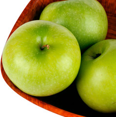 Green apples on plate