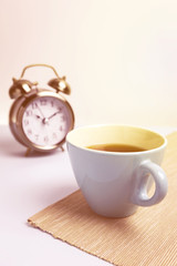 Fototapeta na wymiar Black coffee with clock background, Break time