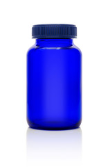 Blank blue glass bottle of supplement product isolated on white