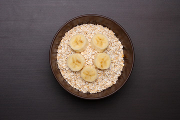 Oat flakes on table. Healthy food concept. Top view