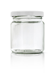 Clear glass bottle with white cap isolated on white background