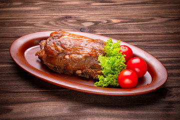 Delicious barbecued ribs seasoned with a spices and fresh herbs