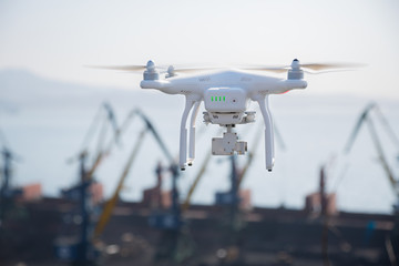 Flying drone armed with camera