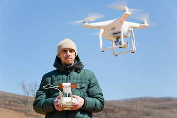 Man controls the flying drones © Stanislav Komogorov