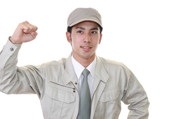 ガッツポーズの作業員