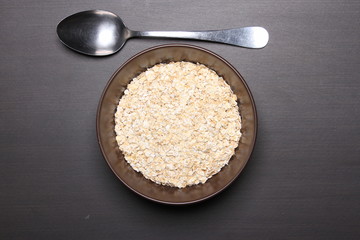 Oat flakes on table.healthy food concept.