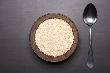 Oat flakes on table.healthy food concept.