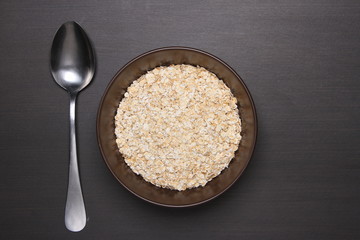 Oat flakes on table.healthy food concept.