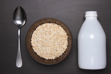 Oat flakes on table.healthy food concept.