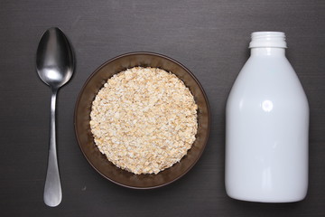 Oat flakes on table.healthy food concept.