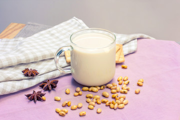 Soy milk with soy bean and cracker in vintage color tone