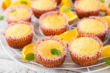 Tasty muffins with oranges and mint