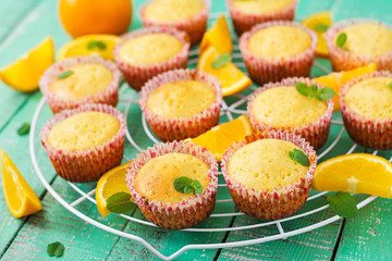 Tasty muffins with oranges and mint