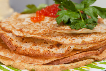 red caviar on pancakes. Russian cuisine