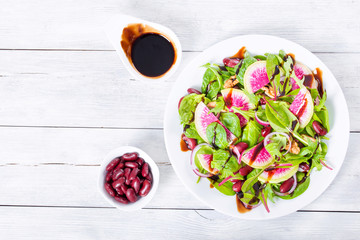 Red beans, watermelon radish , lettuce leaves, walnuts salad, cl