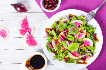 Red beans, watermelon radish , lettuce leaves, walnuts salad, cl