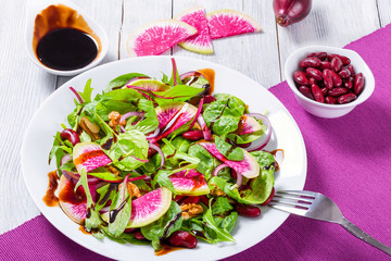 Red beans, watermelon radish , lettuce leaves, walnuts salad, cl