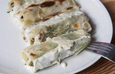 Serving spinach and cheese cannelloni