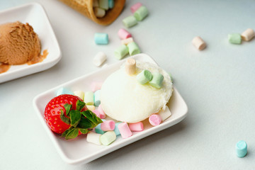 Ice cream sundae, strawberry and candies