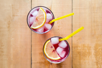 Summer drink with lemon and ice. Top view