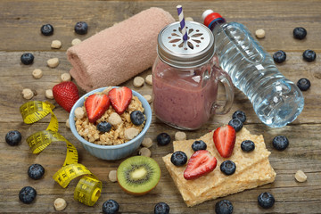 Items for sports on a wooden background