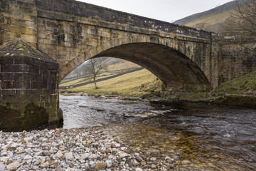 New Bridge on the approach to Kettlewell over the  River Wharfe in the Yorkshire Dales National Park.