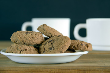 Cookies and two cups of tea