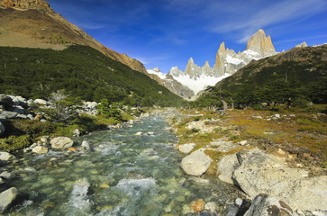 flowing river near mountain Fitz Roy in Argentina Patagonia