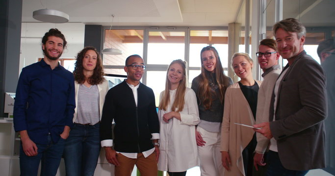 Group of multi-ethnic Startup Entrepreneur posing for business office photo.