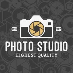 Vector Photo Studio Logo over Camera Shutter and Lenses Pattern