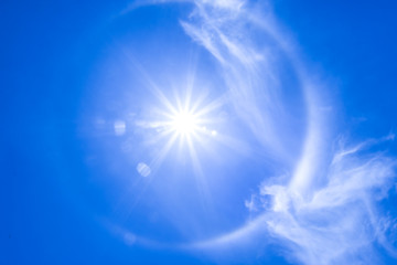 The sun shines bright in the daytime in summer. Blue sky and clo