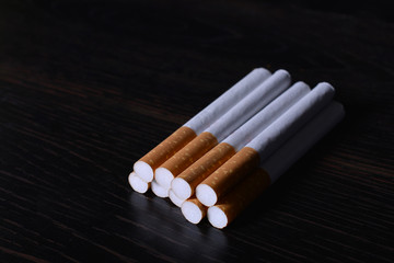 Stack of Cigarettes on black background