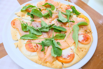 Fresh salmon ham pizza