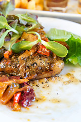 Grilled pork ribs steak and vegetables