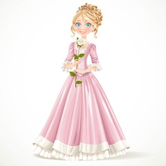 Beautiful young princess in a pink dress holding a white rose is