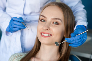 Fototapeta premium Dentist examining a patient's teeth