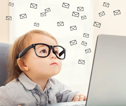Email concept with toddler girl