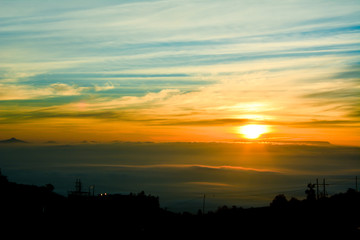 sunset with mountain background