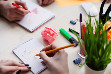 Talented young workers are cooperating in office