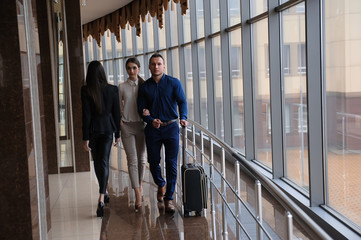 Couple at airport waiting aircraft