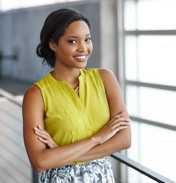 Portrait of a confident black businesswoman at work in her glass office