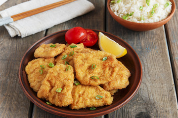 roasted schnitzel chop escalope with lemon tomato rice
