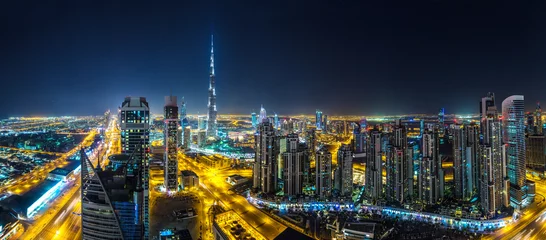 Gordijnen Panorama of Dubai at night © Sergii Figurnyi