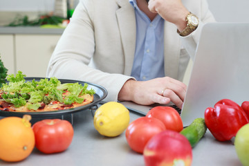 man making a pizza during lunch