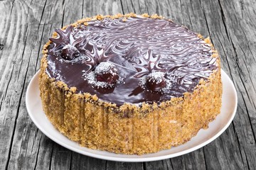 Delicious Chocolate Honey Cherry Cake decorated with chocolate c